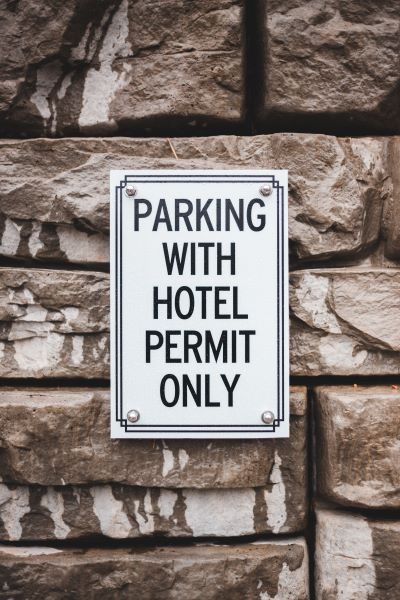 Parking sign, business plan discusses licenses